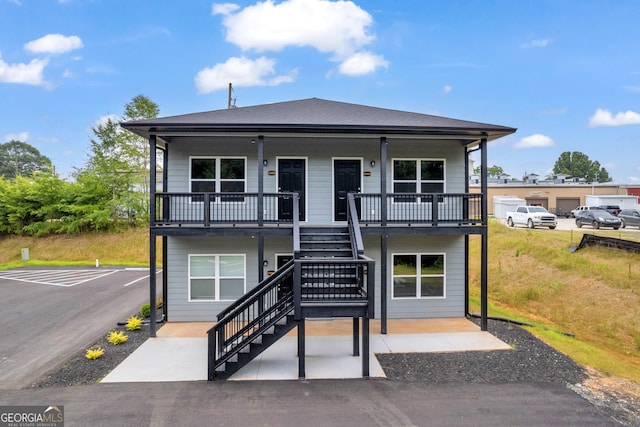 coastal inspired home with covered porch