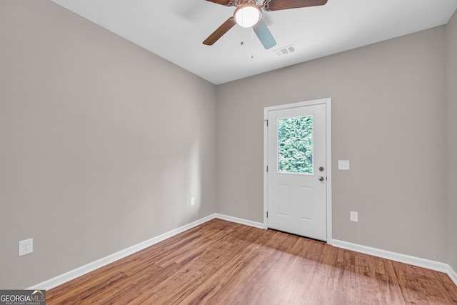 339 Gainesville, Carnesville, GA 30521 - entrance foyer with baseboards, wood finished floors, and ceiling fan