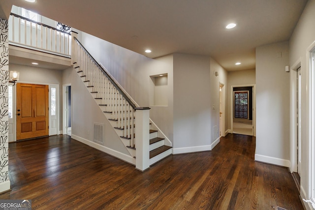 entryway featuring dark wood-type flooring