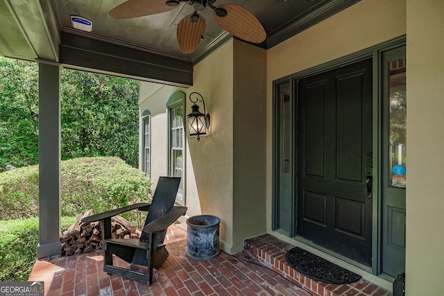 property entrance with ceiling fan