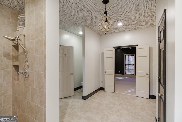 hallway with vaulted ceiling