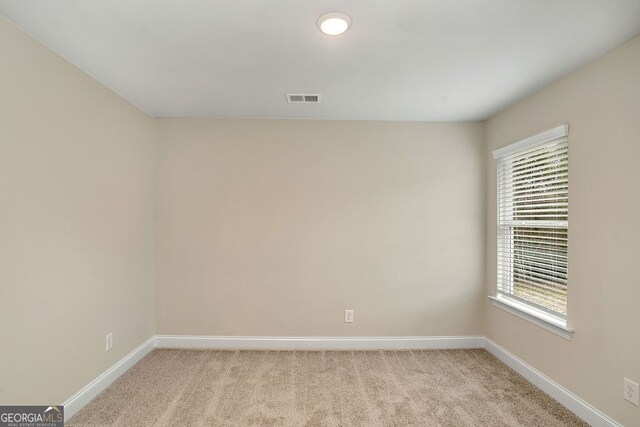 empty room with light carpet