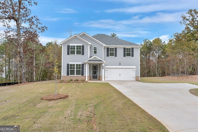 view of front facade with a front lawn and a garage