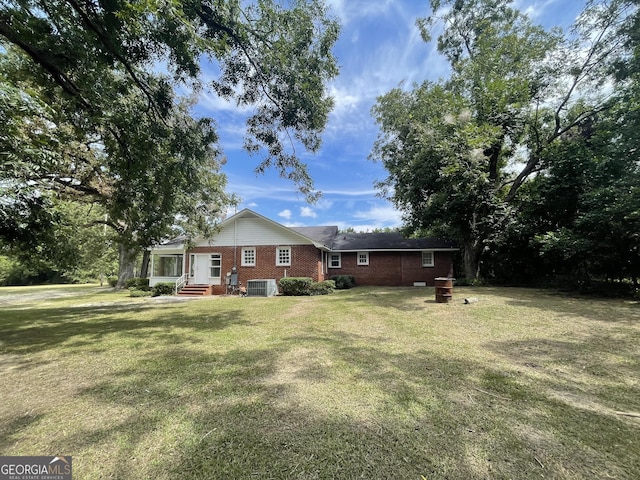 view of yard featuring central AC