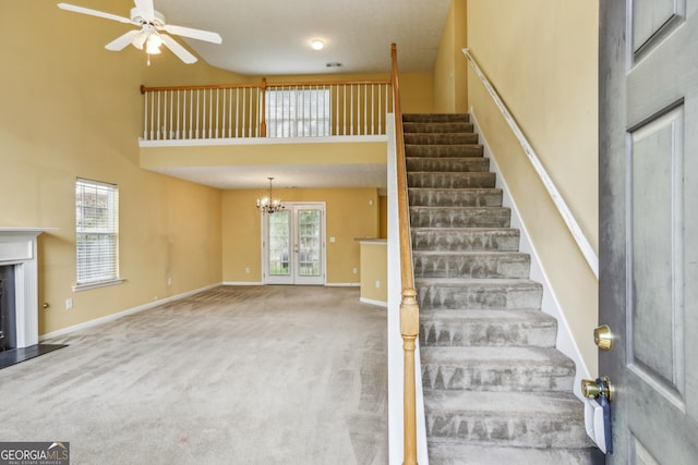 front of property with a garage, central AC, and a front yard