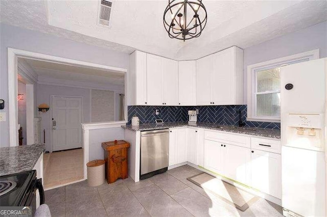 kitchen with dishwasher, white fridge with ice dispenser, hanging light fixtures, decorative backsplash, and white cabinets