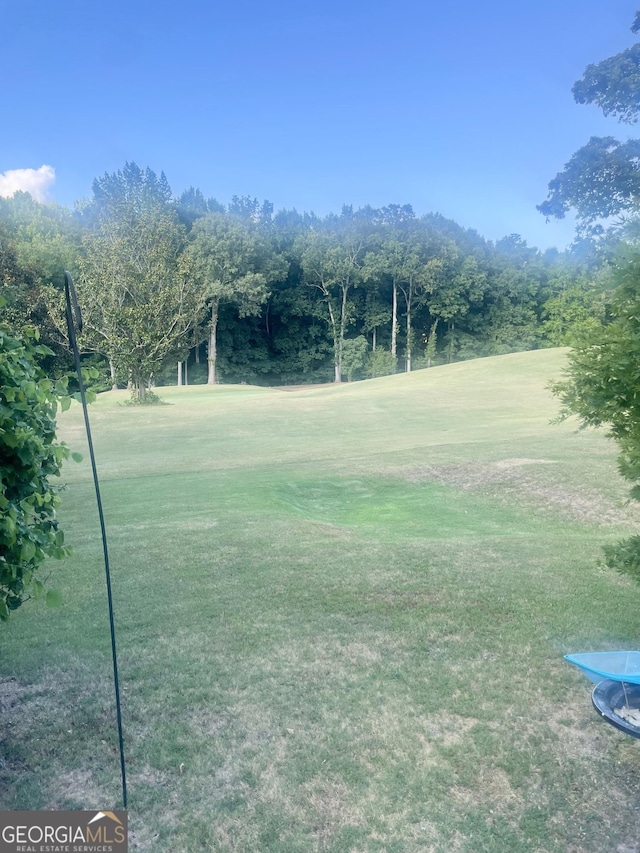 view of yard with golf course view