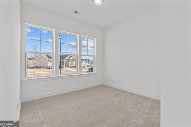 view of carpeted spare room