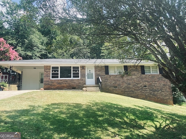 ranch-style home with a front lawn and a carport