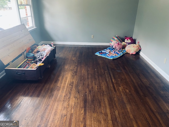 rec room with hardwood / wood-style flooring