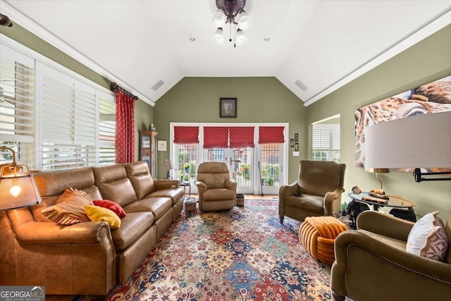 living room featuring vaulted ceiling and ceiling fan