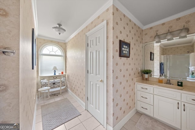 bathroom featuring ornamental molding, tile patterned flooring, a shower with shower door, and vanity