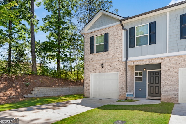 view of front of property with a garage