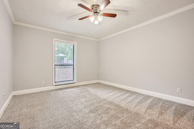 carpeted empty room featuring a textured ceiling, ceiling fan, and crown molding