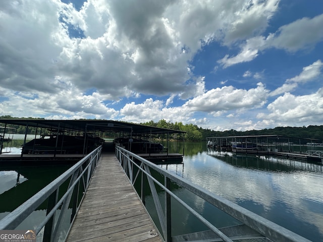 view of dock with a water view