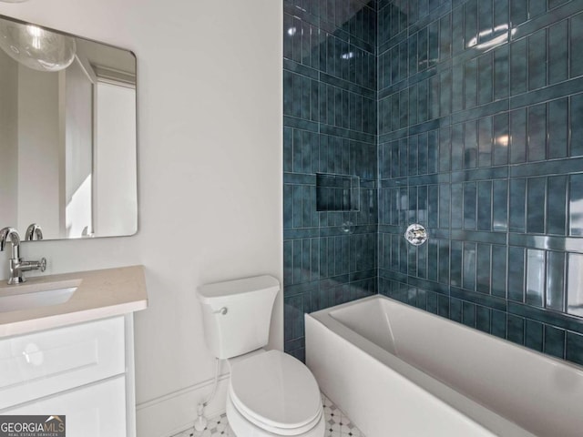 full bathroom with vanity, toilet, tile patterned floors, and tiled shower / bath