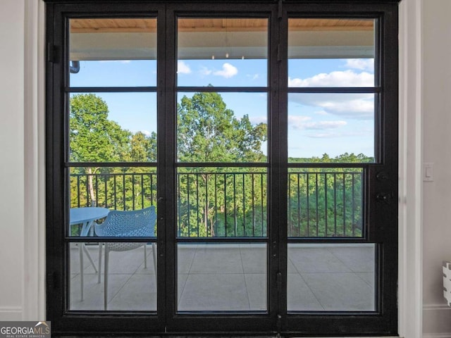 doorway to outside featuring plenty of natural light