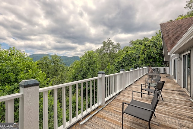 wooden terrace with a mountain view