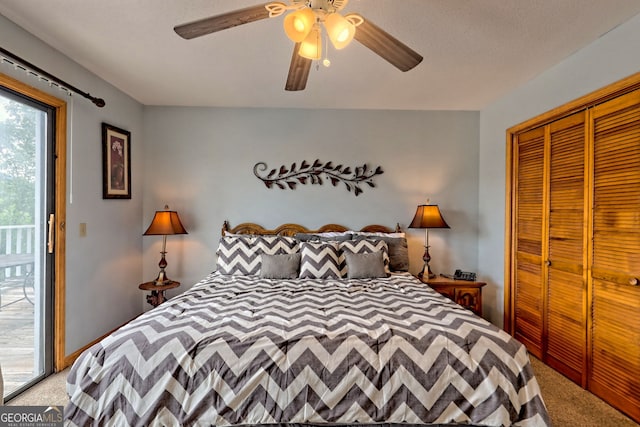 carpeted bedroom with ceiling fan, access to outside, and a closet