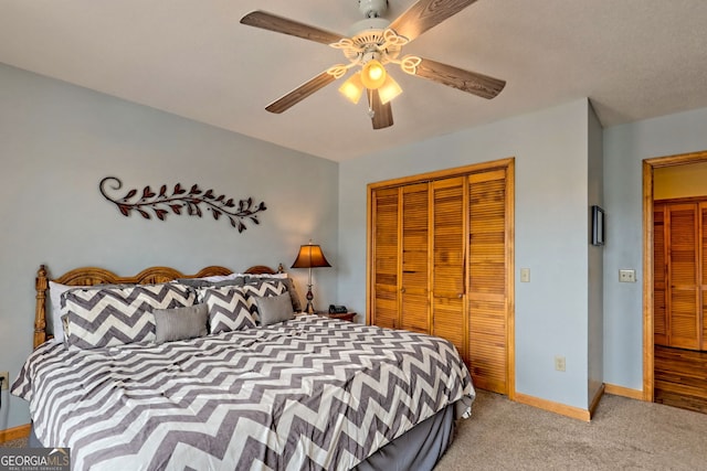 bedroom featuring a closet, light carpet, and ceiling fan