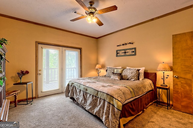 carpeted bedroom with ceiling fan, access to exterior, and ornamental molding