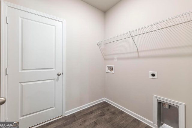 laundry area with hookup for a washing machine, dark hardwood / wood-style floors, and hookup for an electric dryer