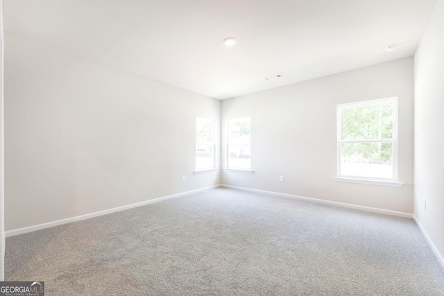 view of carpeted spare room