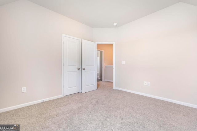 unfurnished bedroom featuring carpet flooring