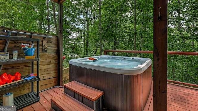 1509 Millenium Dr, Young Harris, GA 30582 - wooden terrace featuring a hot tub and a wooded view