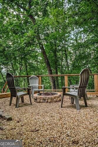 view of play area with a fire pit