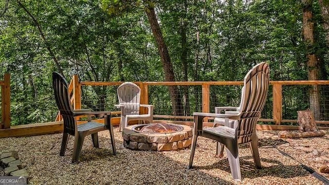 view of patio featuring an outdoor fire pit