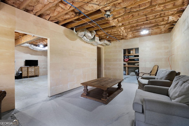 living room with concrete flooring