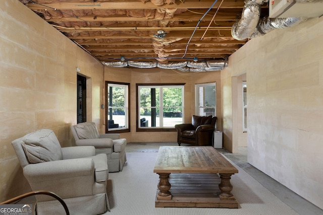 living room with concrete flooring