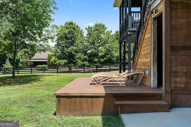 wooden deck with a yard