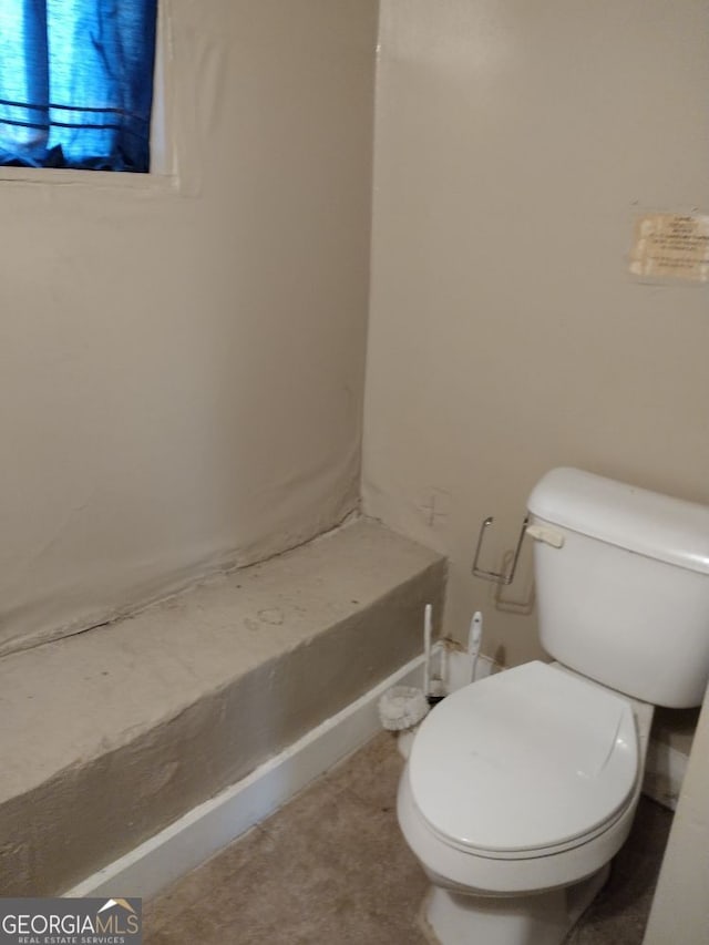 bathroom featuring toilet