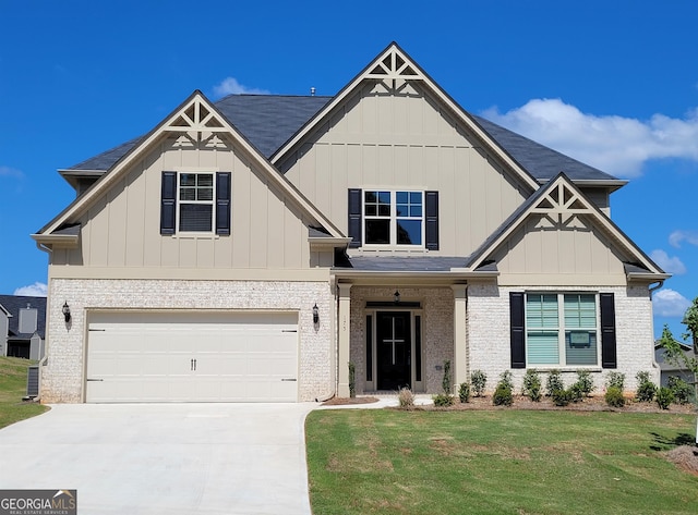 craftsman-style house featuring a front yard and a garage