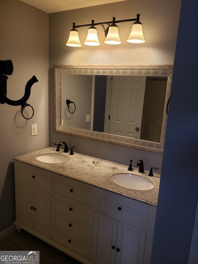 bathroom featuring dual vanity and tile patterned flooring