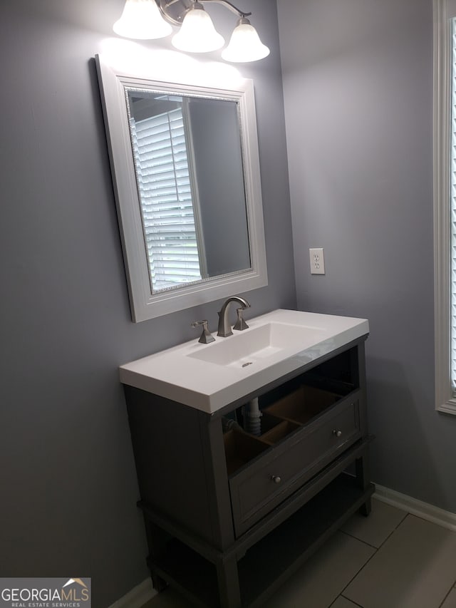 bathroom with vanity and tile patterned floors