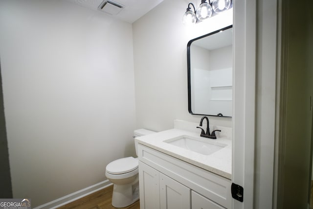 unfurnished bedroom with hardwood / wood-style floors and a textured ceiling