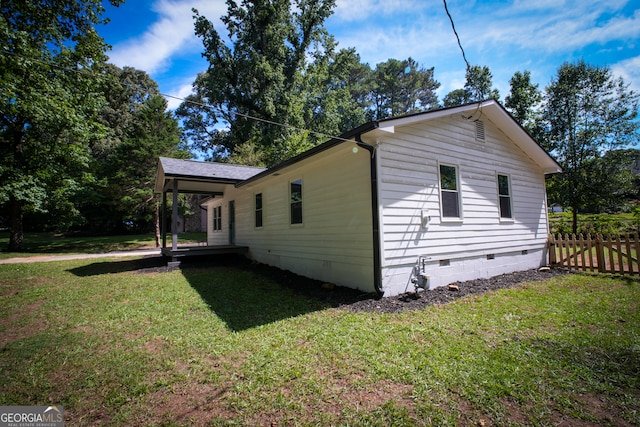 back of property with central AC