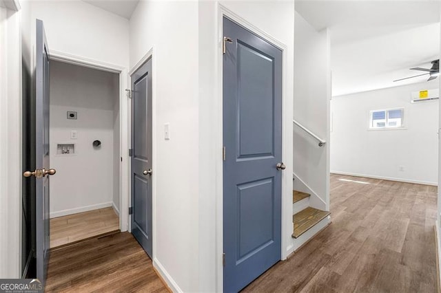 hallway featuring hardwood / wood-style flooring