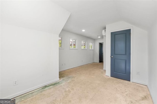 interior space featuring vaulted ceiling