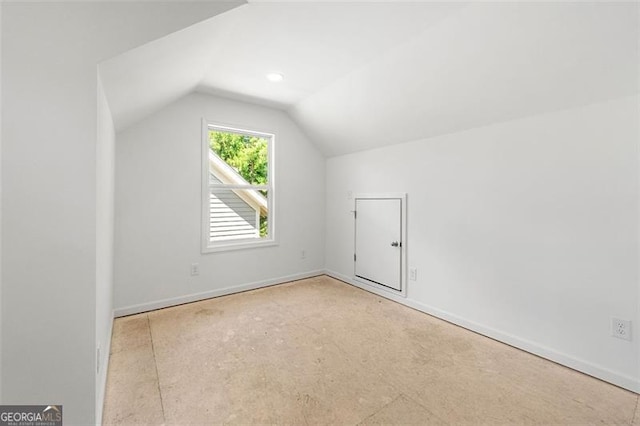 bonus room featuring lofted ceiling