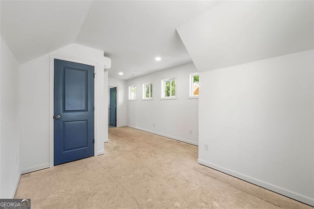 additional living space with lofted ceiling