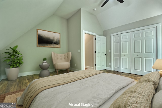 bedroom featuring vaulted ceiling, hardwood / wood-style floors, and ceiling fan