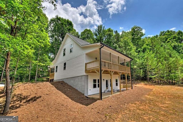 view of side of home featuring a patio area