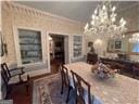 dining space with an inviting chandelier