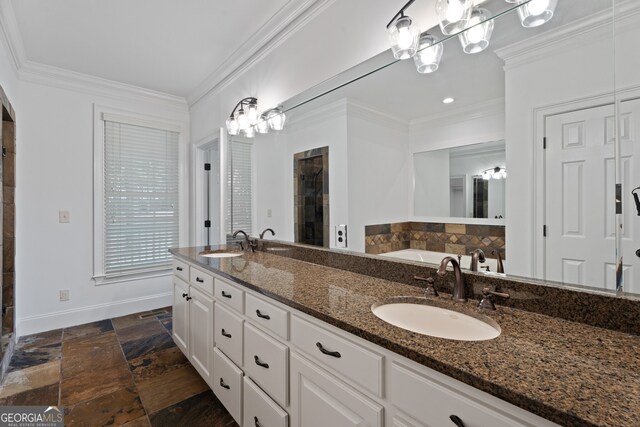 bathroom featuring crown molding, tile patterned flooring, and double vanity