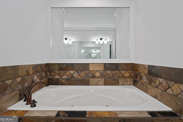 bathroom with tiled tub and ornamental molding