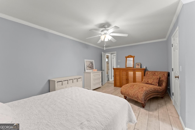 bedroom featuring crown molding, light hardwood / wood-style flooring, and ceiling fan